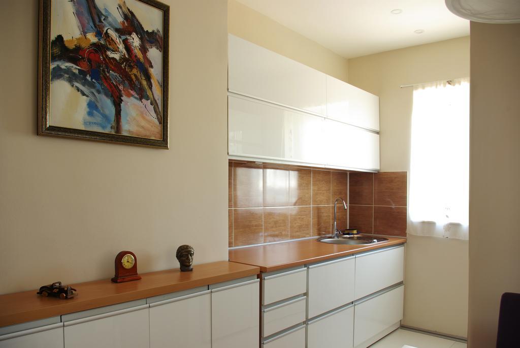 Square Studio Apartment Ni Buitenkant foto