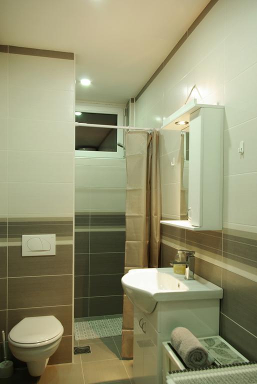 Square Studio Apartment Ni Buitenkant foto