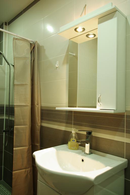 Square Studio Apartment Ni Buitenkant foto